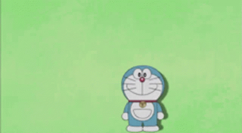 Doraemon Holding Sign Saying I Am Banned GIF