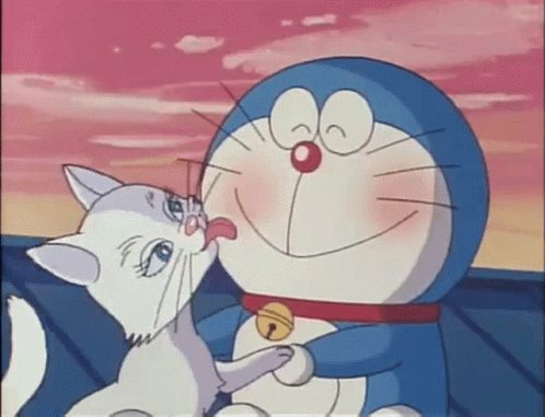 Doraemon Holding White Cat Licking Nose