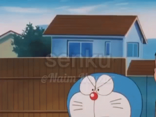 Doraemon in Front of House with Fence