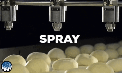 Dough Balls Being Sprayed GIF