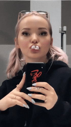 Dove Cameron Chewing Bubble Gum GIF