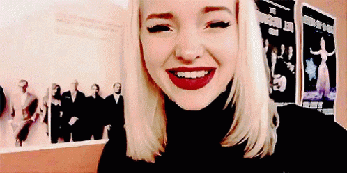 Dove Cameron Happy Giggling GIF