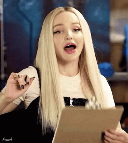 Dove Cameron Holding Checklist GIF