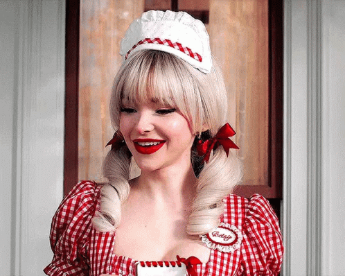 Dove Cameron Laughing Loudly GIF