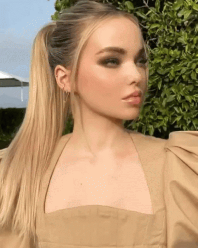 Dove Cameron Posing In Camera GIF