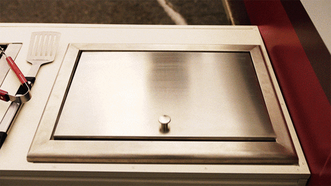 Dr Pepper Cans In Container With Ice GIF