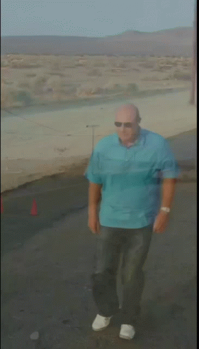 Dr Phil Dancing In The Middle Of The Road GIF