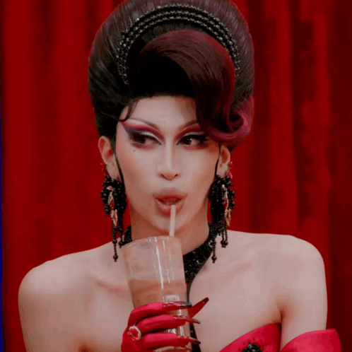 Drag Queen Drinking Through Straw