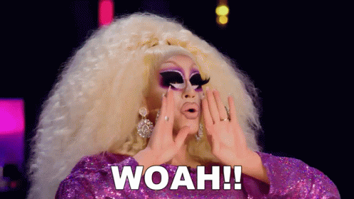 Drag Queen in Purple Dress Saying Woah