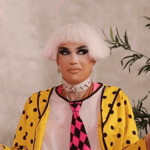 Drag Queen in Yellow and Pink Polka Dot Jacket