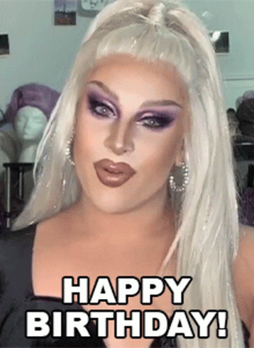 Drag Queen Saying Happy Birthday In Front Of Mannequin GIF