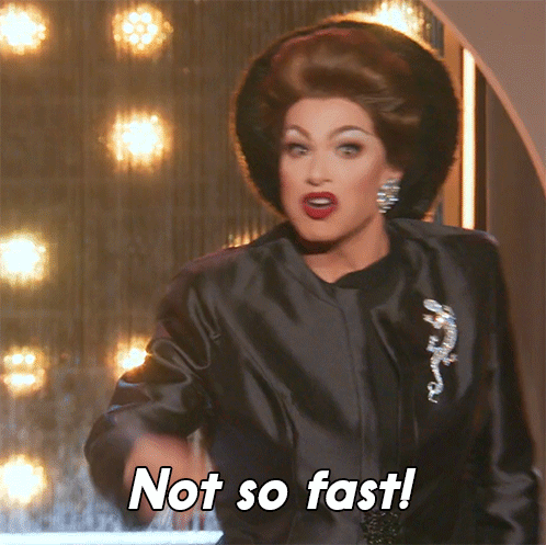 Drag Queen Saying Not So Fast in Black Coat