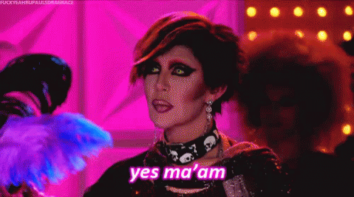 Drag Queen Saying Yes Ma Am With Fan GIF
