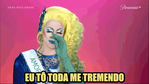 Drag Queen Wearing Sash Saying Amor