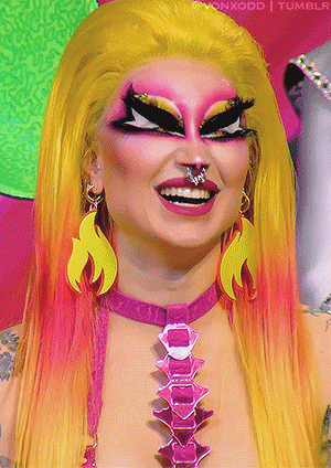 Drag Queen With Pink Necklace and Earrings