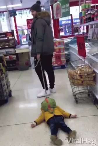 Dragging Child Outside The Store GIF