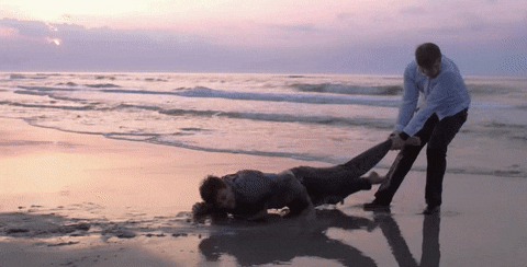 Dragging Someone To The Ocean GIF