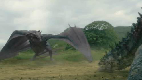 Dragon Flying Over Grassy Field GIF