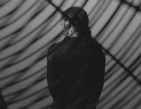 Dramatic Lady In Black Giant Fan GIF