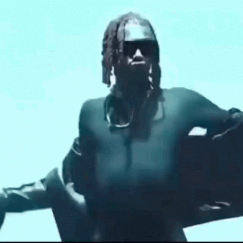 Dreadlocked Man In Sunglasses And Black Jacket GIF