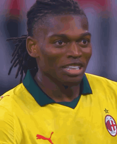 Dreadlocked Man In Yellow Puma Shirt GIF