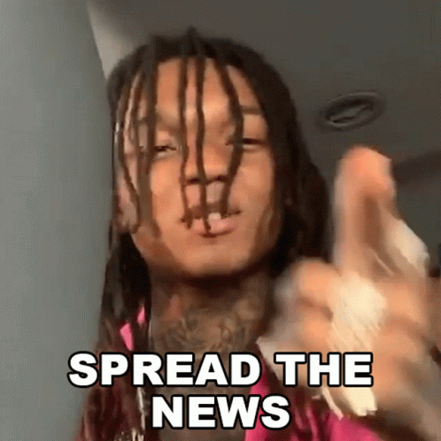 Dreadlocked Man Pointing at Camera Says Spread the News
