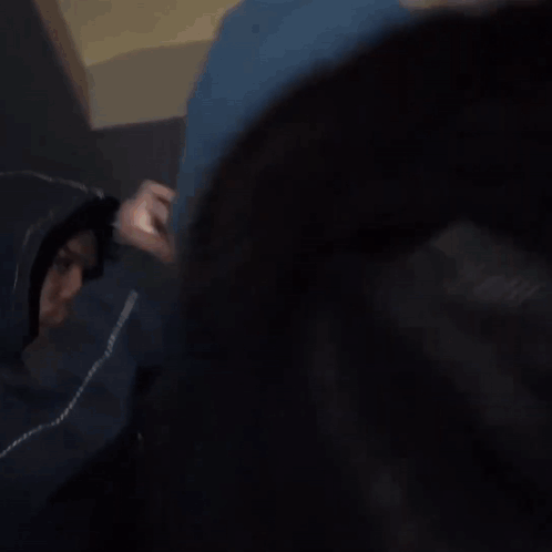 Dreadlocked Man Smoking, Another Drinking From Cup GIF