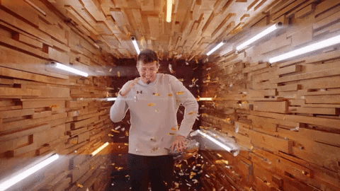 Drew Lock Surrounded By Gold Confetti GIF
