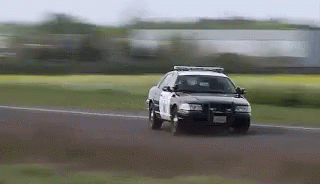 Drifting Police Car Black GIF