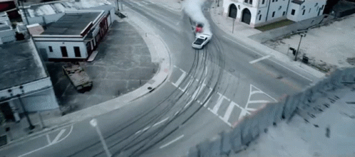 Drifting Red Hellcat Behind White Car GIF