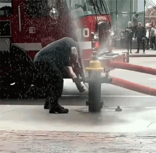Drinking From A Fire Hose Fireman Fail GIF