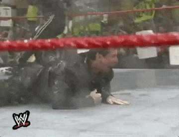 Drinking From A Fire Hose Wrestling Match GIF