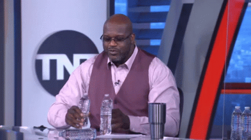 Shaquille O'neal Drinking Two Bottles Of Water GIF