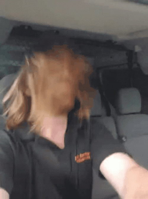 Driving Guy Headbanging GIF
