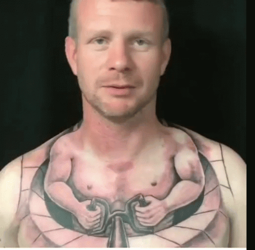 Driving Hand Chest Tattoo GIF