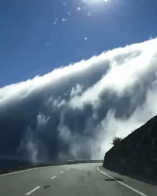 Driving Through A Foggy Mountain GIF