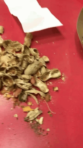 Dropped Peanuts Shell From The Table GIF
