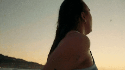 Drowning Through Blue Wave GIF