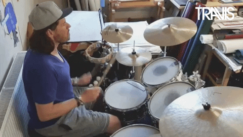 Drummer With Cap Playing Rim Shot GIF
