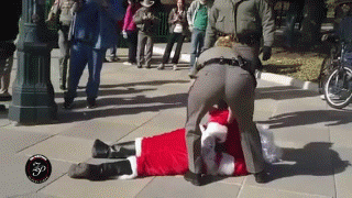 Drunk Santa Arrested By Police GIF