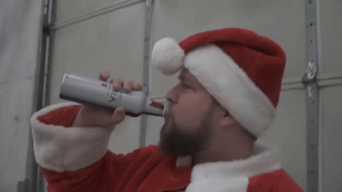 Drunk Santa Drinking From White Bottle GIF