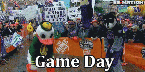 Duck Mascot in Front of Home Depot Sign