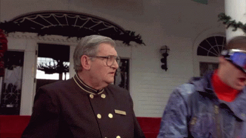 Dumb And Dumber Tuxedo Giving Money GIF