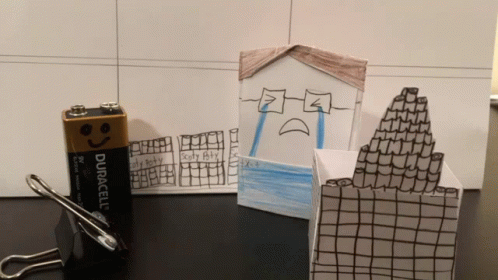 Duracell Battery Next to Sad House Drawing