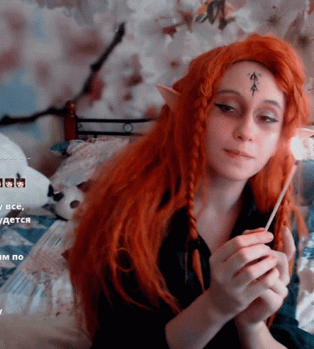 Dwarf Cosplayer Playing With Lighter GIF