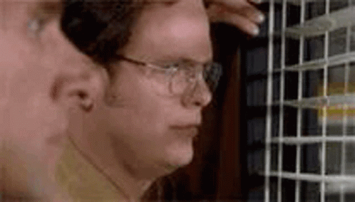 Dwight Schrute The Office Smirk GIF