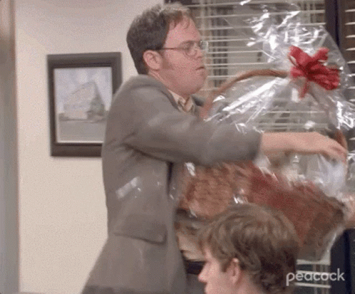 Dwight Office Carrying Gift GIF