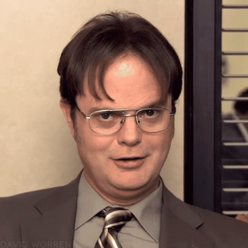 Dwight Schrute Forced Smile GIF