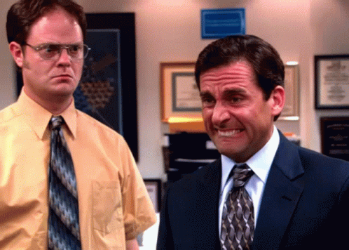 Dwight Schrute And Michael Scott Are Standing Next To Each Other In An Office GIF