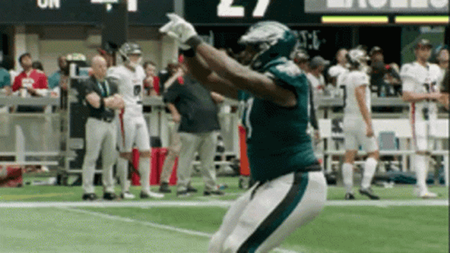 Eagles Players Kicking GIF
